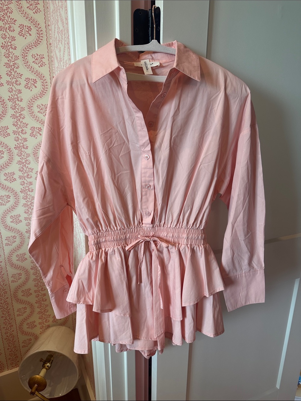 Pink peplum romper